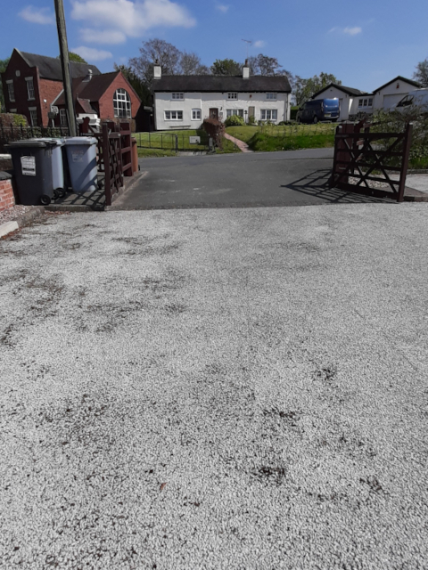 the carpark's tarmac surface