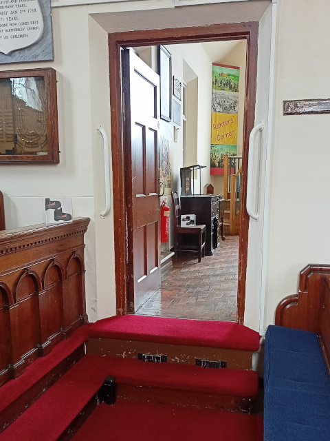 Door through to the main museum display room