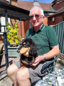 Max the well-behaved dog and his owner